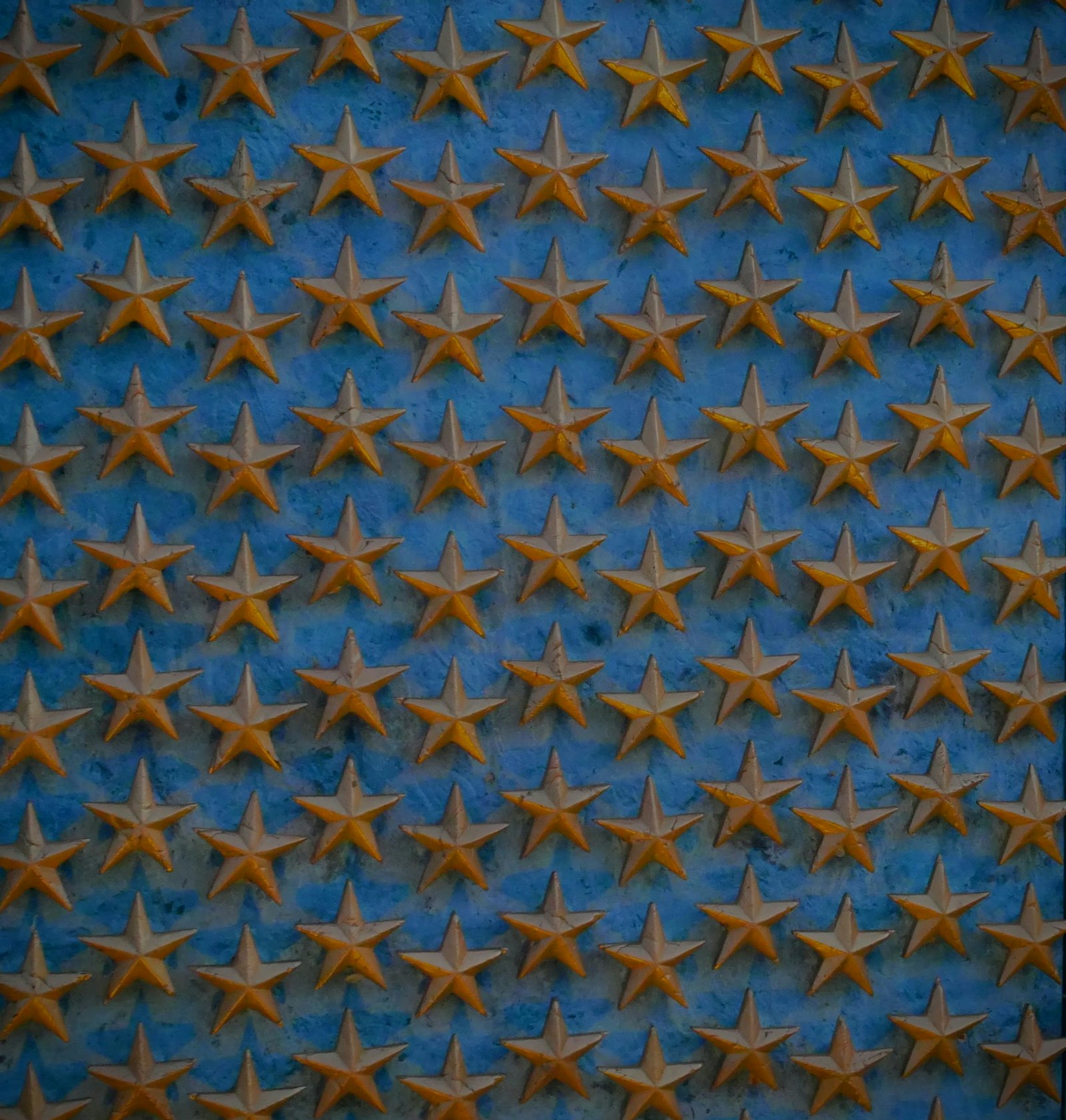 Gold review stars representing the Google reviews a roofing company earns from homeowners after a finished roof